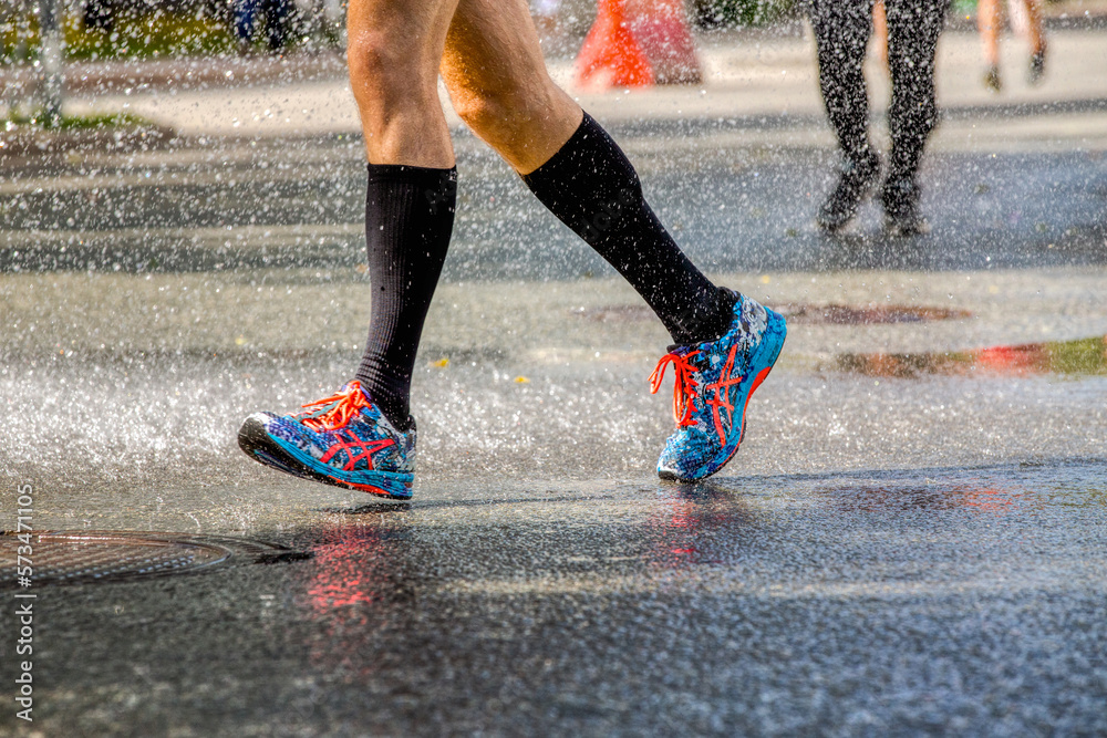 Ekaterinburg, - August 7, 2016: legs man runner in running shoes ASICS in Europe-Asia Marathon Stock Photo | Adobe Stock