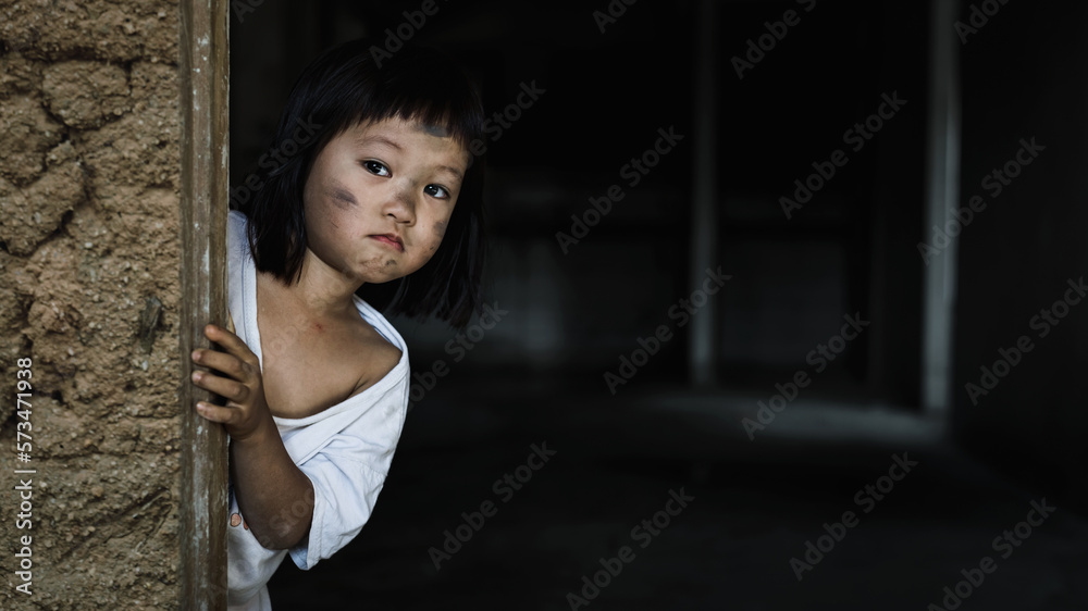 Little girl with eye sad and hopeless. Human trafficking and fear child concept. Little girl with eye sad and hopeless. Human trafficking and fear child concept.
