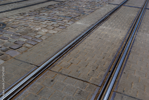 Metallic tracks in urban environment for tram. background image