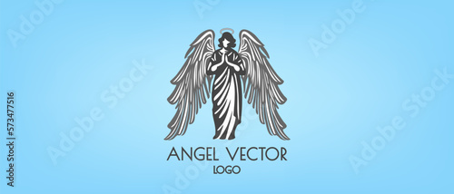 Vector monochrome simple praying angel with a halo and folded wings on a blue background. Logo, emblem or icon.