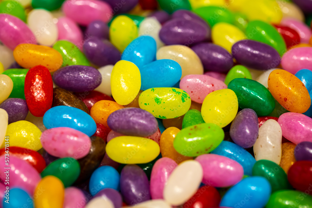 Multicolored chewy candies, candy background, macro shot. Multicolored chewy candies, candy background, macro shot.