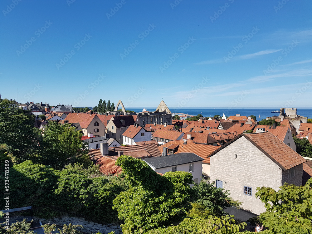 Rooftops and medieval ruins on a summer day in Visby, Sweden