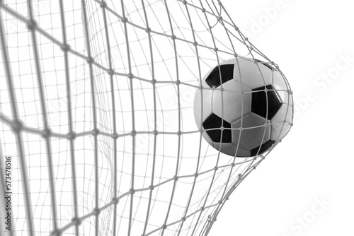 Foto Soccer ball scores a goal on the net in a football match