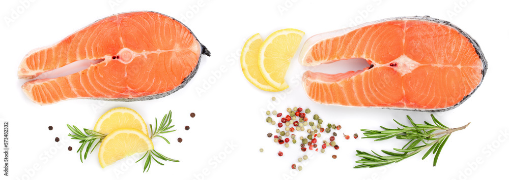 Slice of red fish salmon with lemon, rosemary and peppercorns isolated on white background. Top view. Flat lay Slice of red fish salmon with lemon, rosemary and peppercorns isolated on white background. Top view. Flat lay