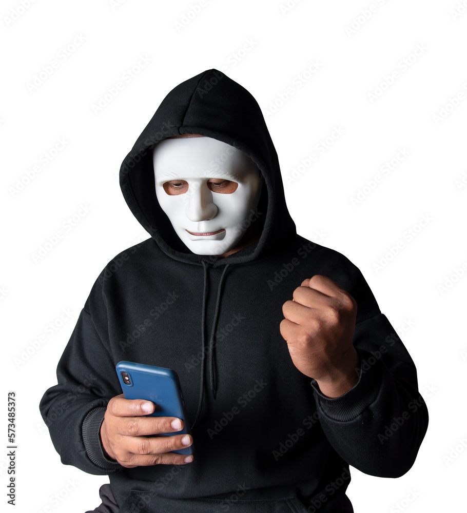 Close-up. An anonymous hacker wearing a mask and black hoodie shows off a smartphone with a blank white screen. Hacking and malware concept. Transparent background. png.file Close-up. An anonymous hacker wearing a mask and black hoodie shows off a smartphone with a blank white screen. Hacking and malware concept. Transparent background. png.file