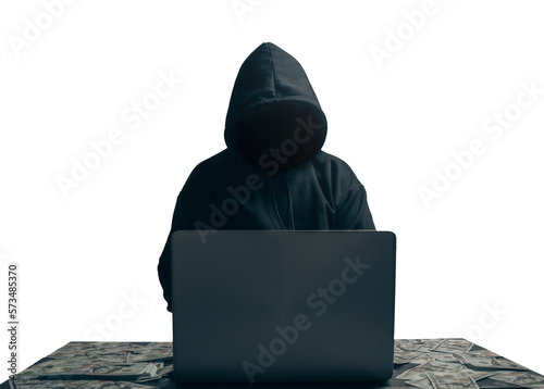 Fotobehang anonymous young man hacker sitting playing laptop with lots of money lying around