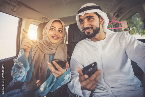 Photography Happy couple driving the car in Dubai