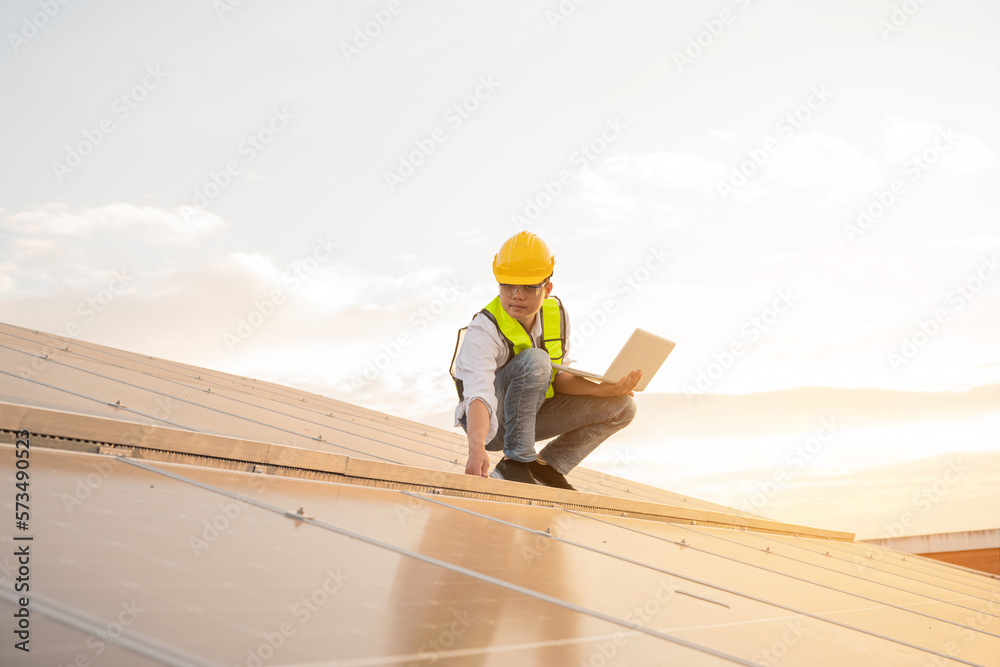 Engineer working on checking equipment in solar power plant,Technology solar energy renewable.