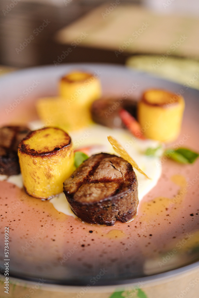 Veal filet mignon with fried potatoes. Delicious Veal filet mignon with fried potatoes. Delicious