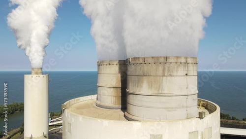 Monroe coal power plant emitting massive amount of smoke into atmosphere, aerial view photo