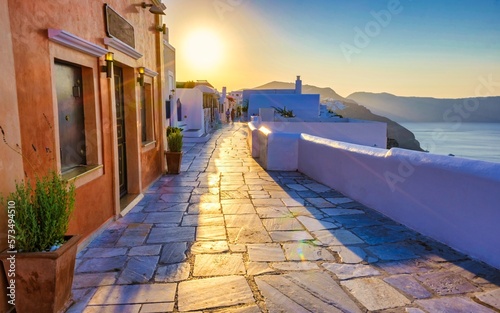 sunrise by the ocean of Oia Santorini Greece, a traditional Greek village in Santorini. photo