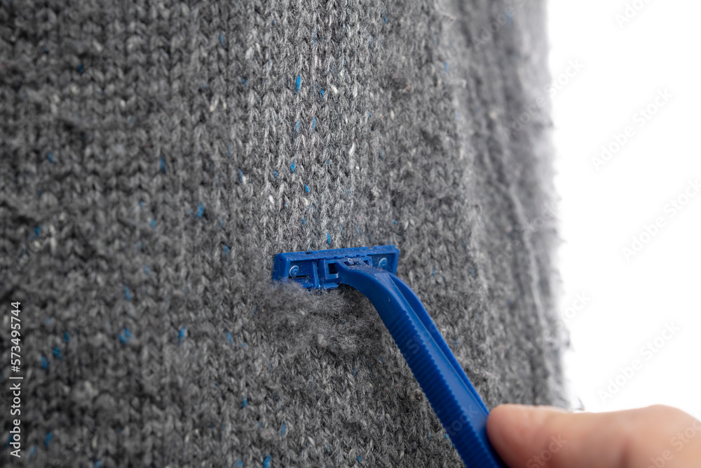 Lifehack; Run your razor along sweater with the direction of blades to remove pills.  