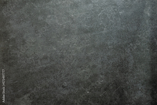 Dark grey wall background, ancient texture, close up.	