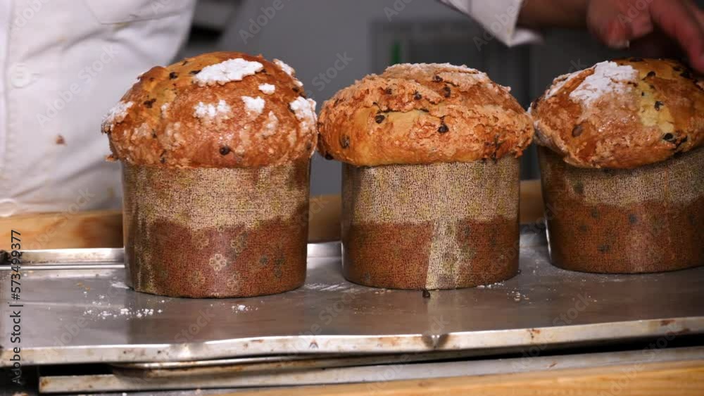 Finishing the preparation of Panettone at the bakery. Italian christmas sweet cakes. . High quality 4k footage