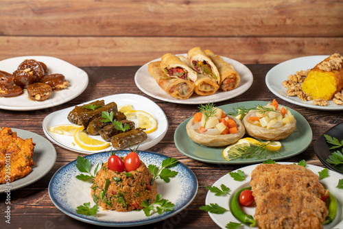 Ramadan table. Turkish food on wooden background. Iftar and sahur delicacies. Turkish oriental dishes. Types of appetizers. close up