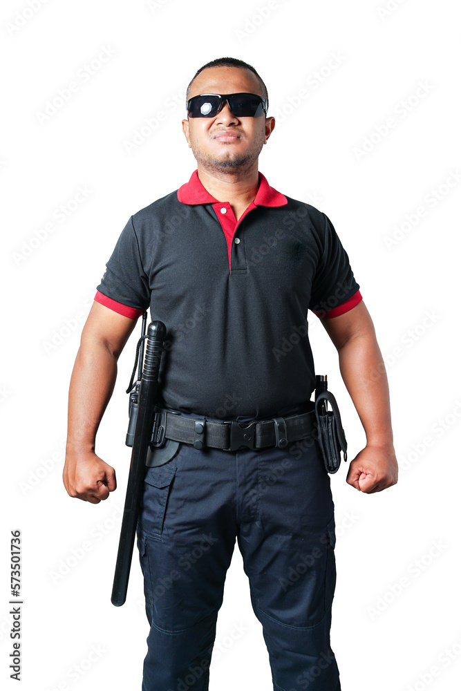 A security guard dressed in black, black goggles, stands looking straight with a strong alert stance and rubber batons. on a white background isolated, cut out. Security concept A security guard dressed in black, black goggles, stands looking straight with a strong alert stance and rubber batons. on a white background isolated, cut out. Security concept
