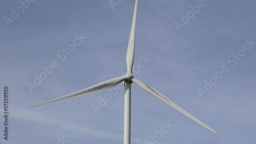 Closeup of a rotating wind turbine. Wales. photo