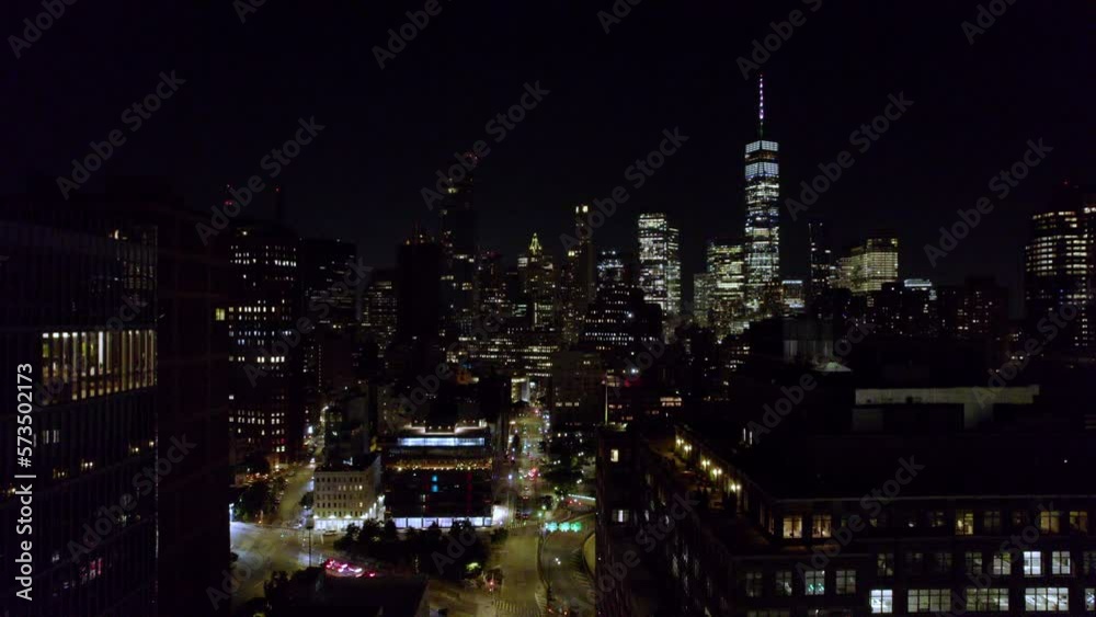 Aerial Drone view of Manhattan Skyline at night. tilt down shot.