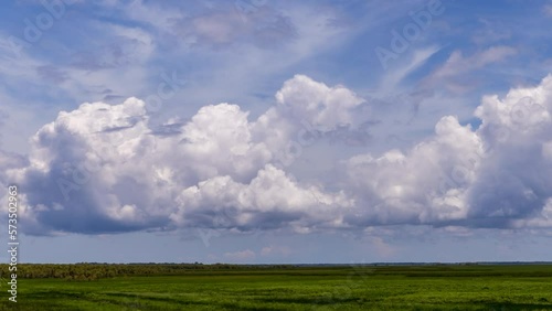 Timelapse of storm clouds moving across wetlands in the Northern Territory photo