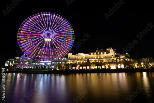 Night photo of the Ferris Wheel at a playground in the Yokohama area of Japan.