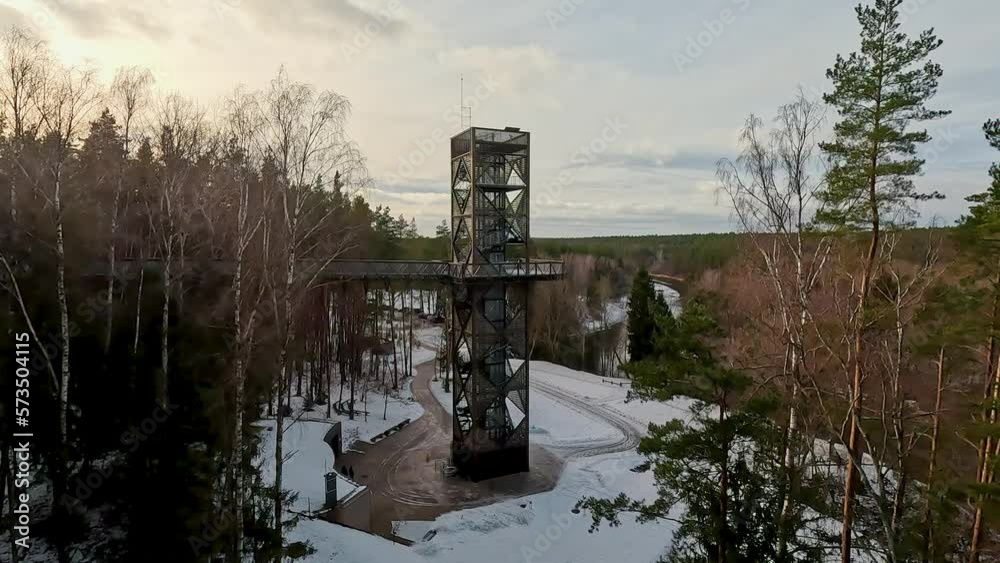 View of Anyksciai Laju Takas, Treetop Walking Path Complex With a Walkway, an Information Center and Observation Tower, Located in Anyksciai, Lithuania Near Sventoji River. Sunny Winter Day View of Anyksciai Laju Takas, Treetop Walking Path Complex With a Walkway, an Information Center and Observation Tower, Located in Anyksciai, Lithuania Near Sventoji River. Sunny Winter Day