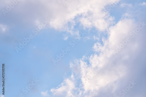 Background of blue sky with white clouds © OLAYOLA