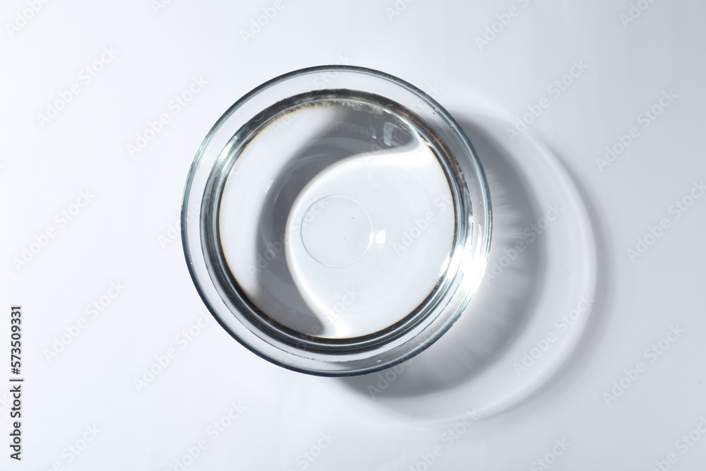 Glass bowl with water on white background, top view Glass bowl with water on white background, top view