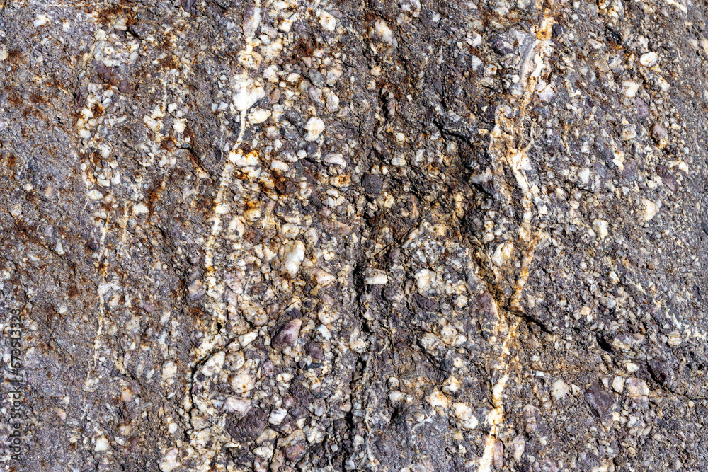 Rock, stone, textured. Background for design. Stones texture nature photo. Rock background. Mountain close-up. Mountain texture. High quality photo.