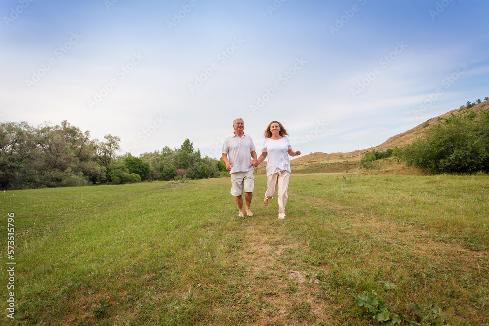 Happy couple running