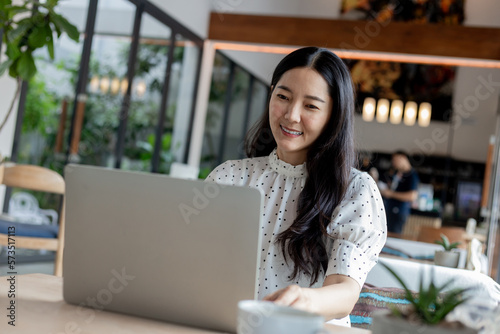 woman work using computer hand typing laptop keyboard contact us.student study learning education online.adult professional people chatting search at office.concept for technology device business