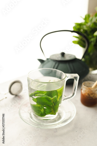 Tea with fresh mint leaves. Mint infusion helps with digestive problems