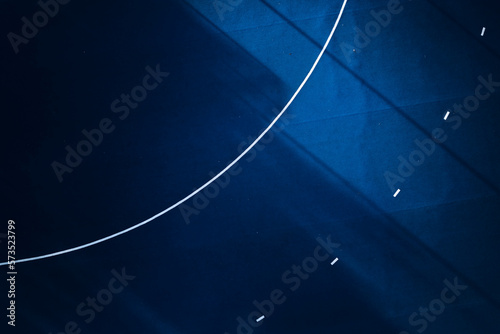 Photography part of the area of a blue synthetic hockey field