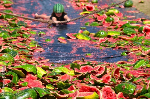 Obraz na płótnie Unrecognizable person watermelon skiing at The Chinchilla Melon Festival w salonie