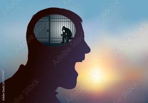 Concept de la souffrance psychique et des maladies mentales avec le symbole d’un homme dont le cerveau est remplacer par une cellule de prison.