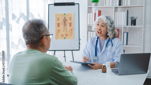 Elderly medical asian people with patient, Physical check-ups and encouragement for treatment of rheumatism and cancer The concept of health insurance for the elderly and health care