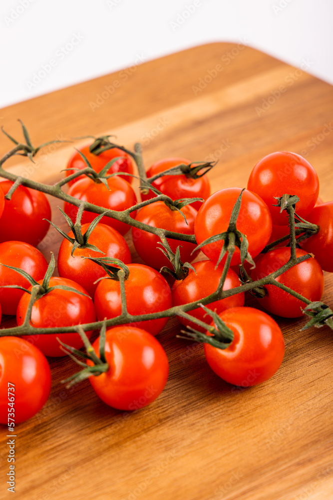 Red Tomatoes on chopping board