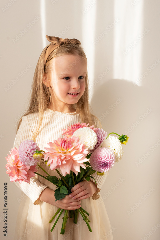 Beautiful little girl holding a bouquet of flowers. Mother's day
Spring Beautiful little girl holding a bouquet of flowers. Mother's day
Spring