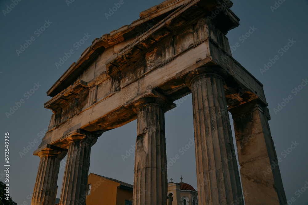 old ruins of the temple of apollo at night in Athens, Greece.