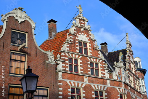 The colorful facades of historic houses located along Kerkstraat street in the city center of Hoorn, West Friesland, Netherlands photo