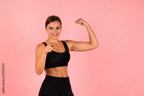 You Can Do It. Sporty Woman Showing Biceps And Pointing At Camera,