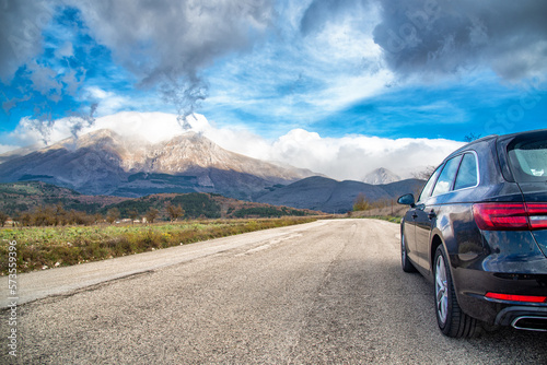 car for traveling with a mountain road