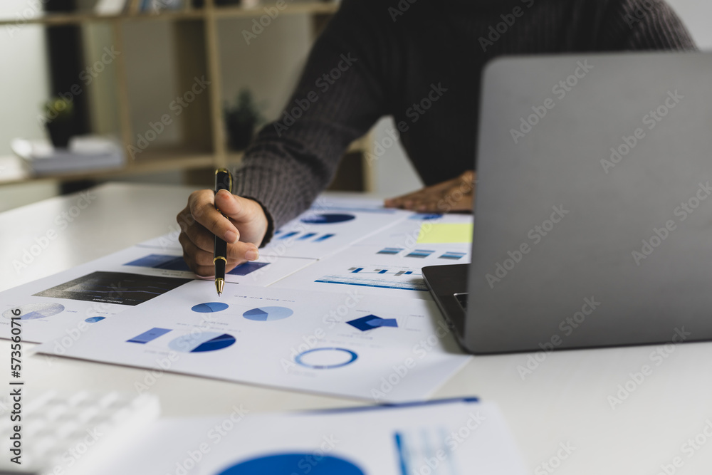 Business woman in office working on laptop reading financial account report, statistic, accounting analysis. Business woman in office working on laptop reading financial account report, statistic, accounting analysis.