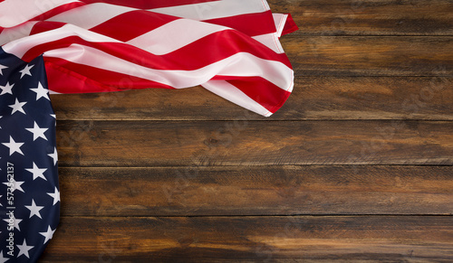 Fototapeta Naklejka Na Ścianę i Meble -  Wooden background with an american flag