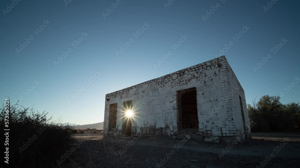 Time Lapse Sun Sunrise Shining from Door of Abandoned Building in Death Valley Junction Time Lapse Sun Sunrise Shining from Door of Abandoned Building in Death Valley Junction