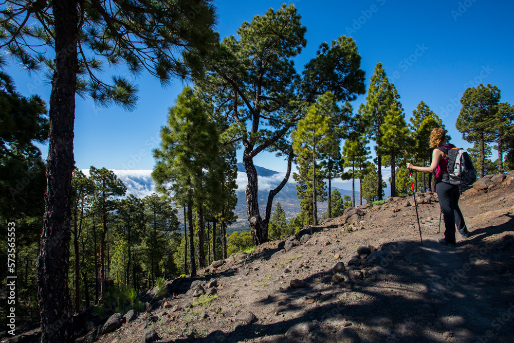 Young woman summit to Bejenado Peak in Caldera de Taburiente, La Palma, Spain Young woman summit to Bejenado Peak in Caldera de Taburiente, La Palma, Spain