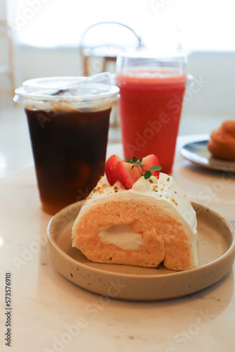 roll , cake roll or Swiss roll with strawberry  and strawberry smoothie