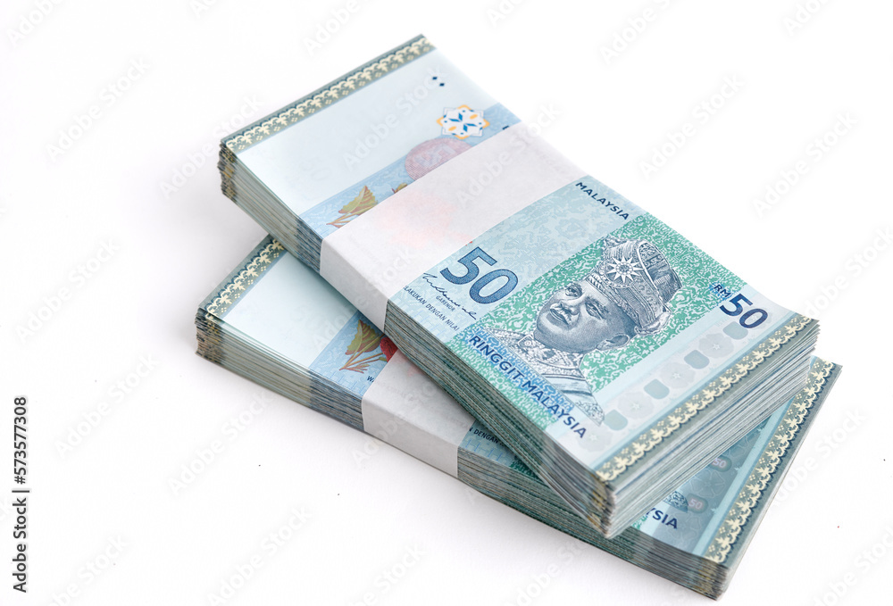 Stack of Ringgit Malaysia bank note on white background. Malaysia Currency Ringgit RM50 Stack of Ringgit Malaysia bank note on white background. Malaysia Currency Ringgit RM50