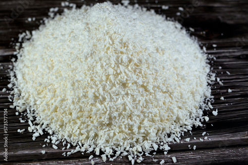 Shredded dried coconut fruit that is used in Ramadan month desserts and sweets bakery and in Yameesh compote that Muslims have on their breakfast of their fasting, Ramadan food background isolated photo