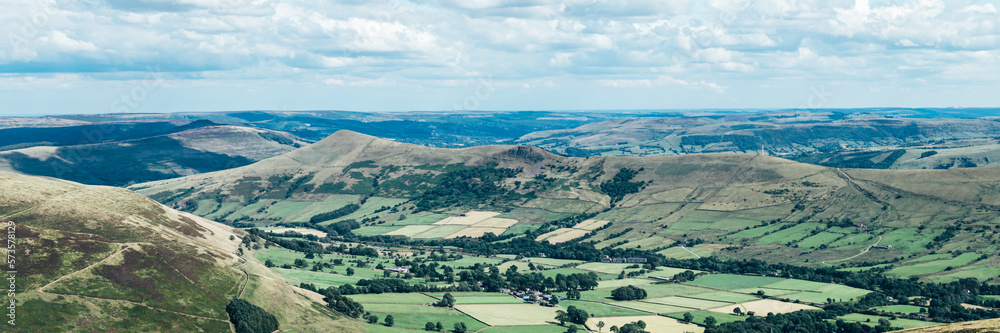 Obraz premium Beautiful field view on Edale village and Mam Tor at Peak District National Park, England, UK. Staycation concept of traveling local, banner size