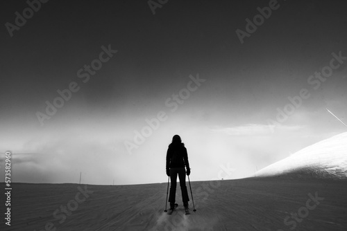 A lone skier skies down the mountain  © Matt